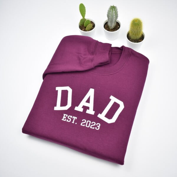 Custom embroidered sweatshirt with name and heart on sleeve. DAD embroidered crewnecks with custom font embroidery. Perfect personalized gifts for dad, mom, grandpa, grandma. Couples gift, matching hoodies.