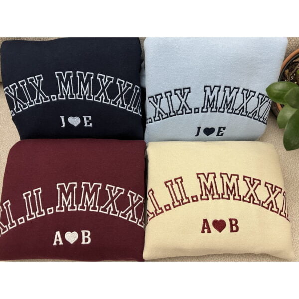 couple sweatshirts with big roman numeral embroidery. Light blue, navy, white and garnet thread.